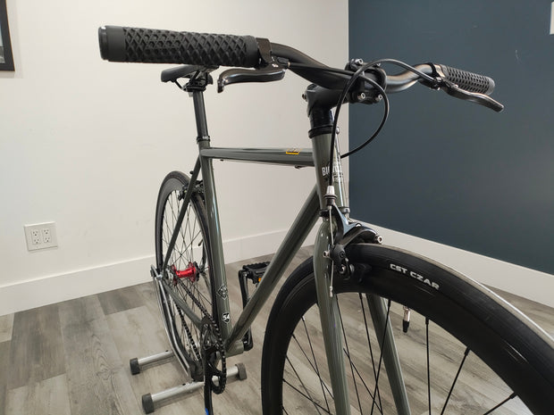 #1319 - Core Line | Earthstone w/ Riser Bars (Size 54cm, Excellent Condition – Upgraded Rear Tire)