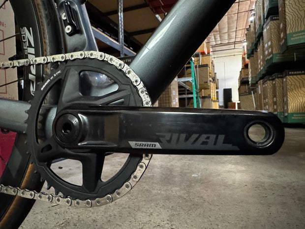 #1276 - Undefeated Road Carbon | Graphite (Size 48cm, Used Condition – Team Rider Bike)